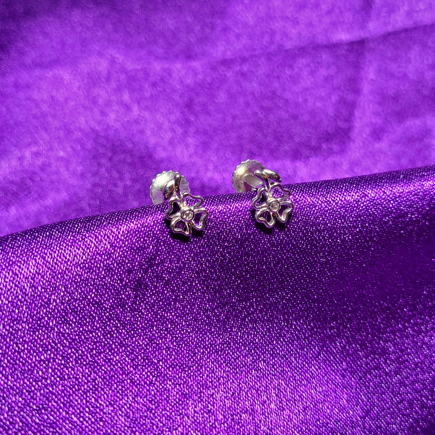 Silver Floral Stud Earrings with transparent curves