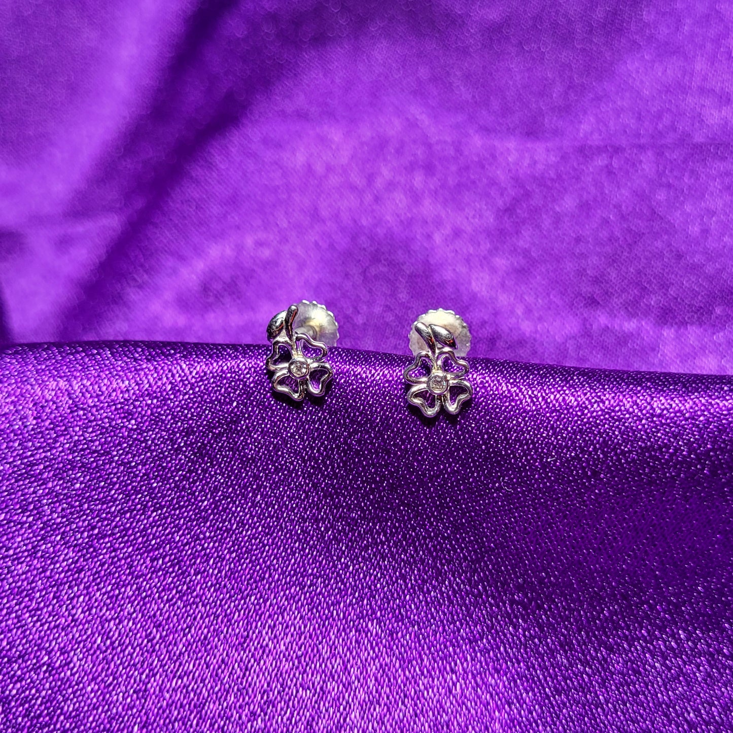 Silver Floral Stud Earrings with transparent curves